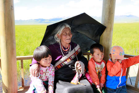 Grandmother and her grandchildren のeditorial素材