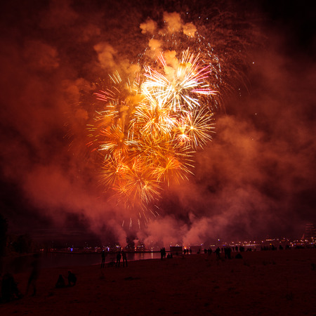 Beautiful fireworks during New Yearâs Eve celebration in Riga, Latviaの写真素材