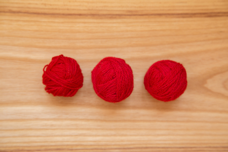 A beautiful yarn balls in vibrant colorful tonesの写真素材