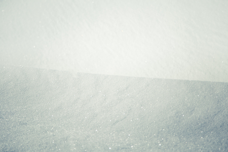 A beautiful closeup pattern of snow in a Norwegian winter dayの写真素材