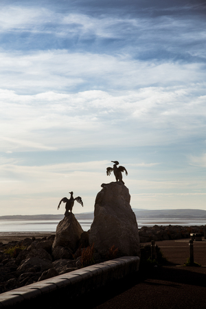 A beautiful bird statues on the Morecambe coastの写真素材