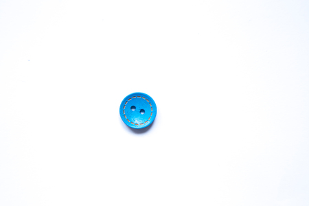 Beautiful colorful buttons on a white background. Beautiful handcraft composition. A button on a white background.の写真素材