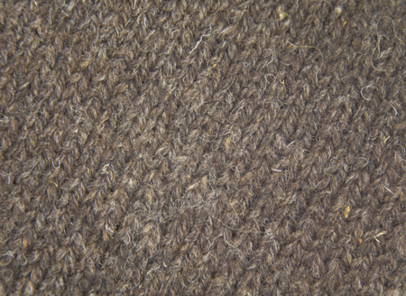 Colorful pattern ow a hand made wool socks. Natural clothing. Bright colors, close up pattern.の写真素材