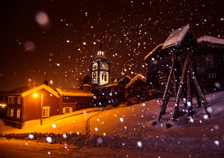 A beautiful night landscape of a historic town Roros in central Norway. Winter sceney on the streets of beautiful town.の写真素材