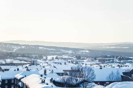 A beautiful morning landscape of Roros. Historic town in central Norway. Winter landscape of a small town.の写真素材