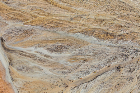 Beautiful sand patterns on the shore of baltic sea. Abstract, colorful background of sand on the...