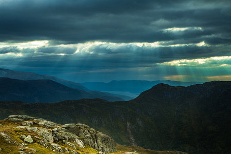 A beautiful autumn landscape in Folgefonna National Park in Norway during a hike in windy, rainy weather. Mountains in Scandinavia. Autumn scenery in wilderness.の写真素材
