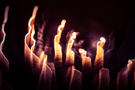 A beautiful, abstract artistic image of New Year Eve fireworks. Colorful picture with blur and...