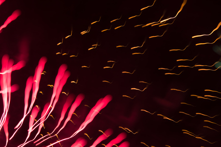 A beautiful, abstract artistic image of New Year Eve fireworks. Colorful picture with blur and lights.  Festive background image.の写真素材