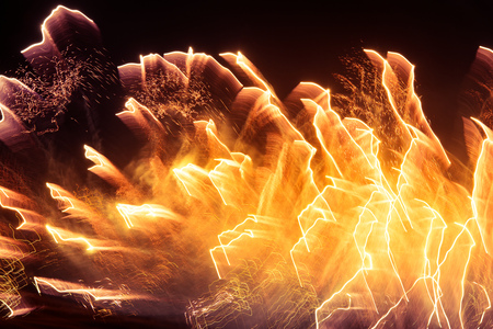 A beautiful, abstract artistic image of New Year Eve fireworks. Colorful picture with blur and...