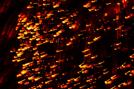 A beautiful, abstract artistic image of New Year Eve fireworks. Colorful picture with blur and lights.  Festive background image.の写真素材