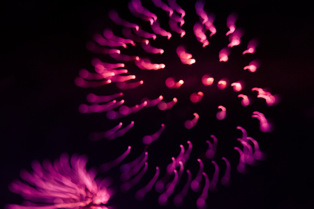 A beautiful, abstract artistic image of New Year Eve fireworks. Colorful picture with blur and lights.  Festive background image.の写真素材