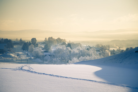 A beautiful morning sceney of a small Norwegian town Roros in winter. World heritage site. Scandinavian winter landscape.の写真素材
