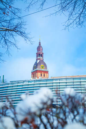 A beautiful details of a snowy Riga - capital of Latvia. Winter day in the city of Northern Europe.
