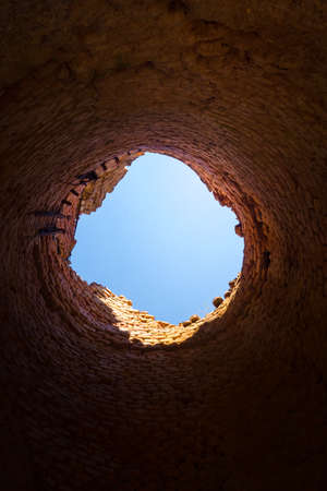 A sunny spring day landscape of old red brick ruins in the forest. Old building in the Northern Europe.の写真素材