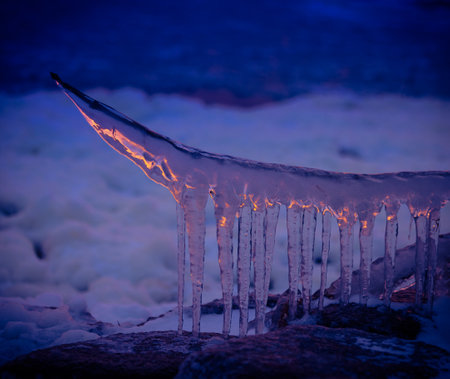 A beautiful, colorful scenery of winter river ice in Latvia. Ice conditions in Northern Europe.の写真素材