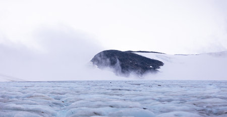 A beautiful landscape of ice on a small glacier in Sarek National Park in Sweden. Wild scenery of...