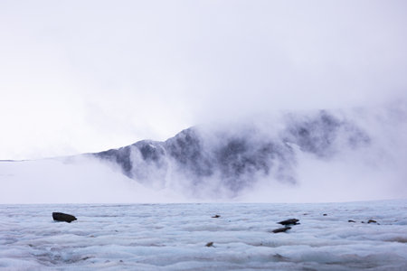 A beautiful landscape of ice on a small glacier in Sarek National Park in Sweden. Wild scenery of...