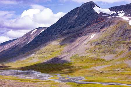 A beautiful summer landscape of Sarek National Park with river. Wild scenery of Northern Europe.の写真素材