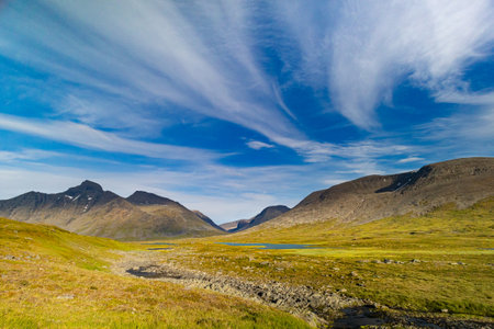 A beautiful summer landscape of Sarek National Park with river. Wild scenery of Northern Europe.の写真素材
