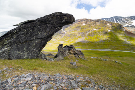 Large rock formation in Sarek National Park, Sweden. Summer landscape of Northern Europe mountain wilderness area.の写真素材