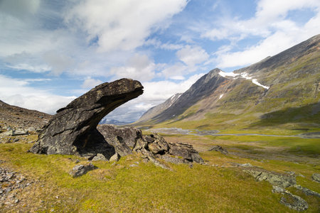 Large rock formation in Sarek National Park, Sweden. Summer landscape of Northern Europe mountain wilderness area.の写真素材
