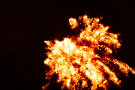 An artisctic picture of New Year's fireworks in the dark sky. Long exposure, bokeh, abstact....