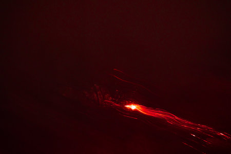 An artisctic picture of New Year's fireworks in the dark sky. Long exposure, bokeh, abstact. Colorful, abstract picture of celebration.の写真素材