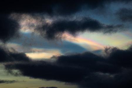 A rare polar stratospheric cloud display in the winter skies in Norway. Colorful ice crystals in the...