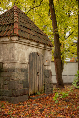 Beautiful autumn scenery with buildings and trees. Riga, Latvia.の写真素材