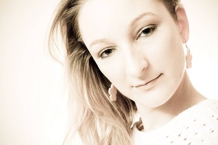 portrait of an attractive beautiful blond woman smilingの写真素材