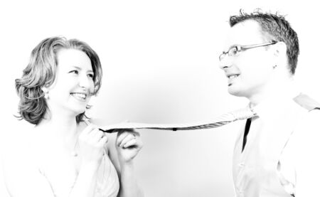 Young Beautiful Happy Couple Smiling in the Engagement Day in a tender momentの写真素材