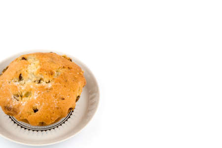 Cake on the saucer over white backgroundの写真素材