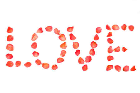 Inscription Love maked from red rose petalsの写真素材