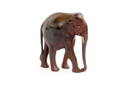 Wooden carving elephant toy isolated over white backgroundの写真素材