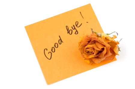 Orange note paper with inscription good bye and rose bud isolated over whiteの写真素材