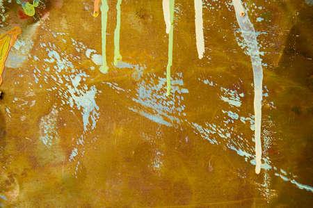 The real rusty metal surface with sparks of a paint