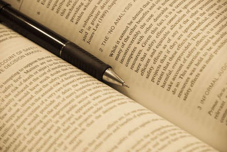 Closeup of a pen on the textbook.の写真素材