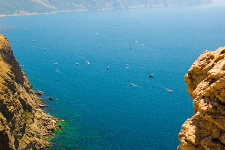 Sea coastline with a lot of boats in the waterの写真素材