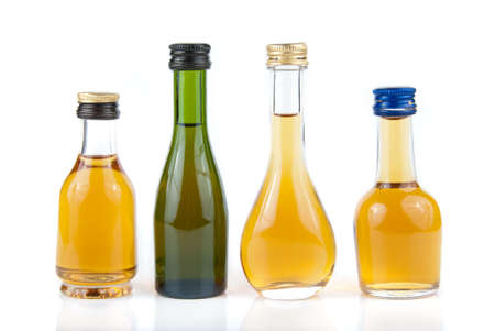 Full minibar bottles isolated over white backgroundの写真素材