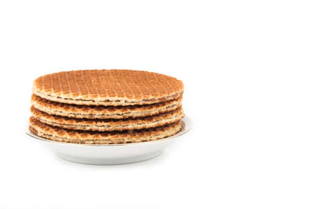 Waffles in a stack on the plate isolated over white background
の写真素材