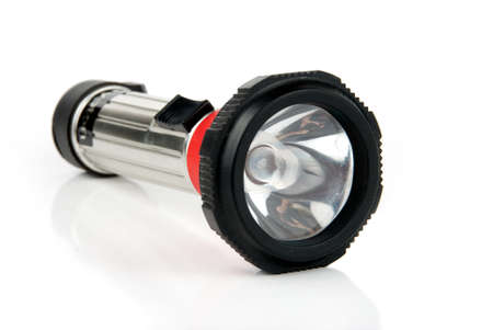 Metal pocket torch isolated over white background