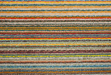 The mixed color real striped carpet texture の写真素材