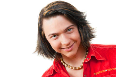 Studio portrait of happy young long-haired guy. Isolated over white.の写真素材