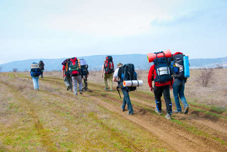 Hikers walk along the footpathの写真素材