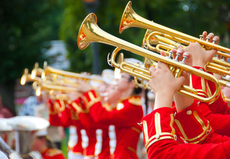 Girl Brass Band in red uniform performingの写真素材