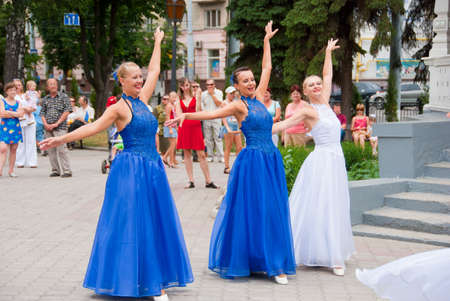 SUMY - JUNE 28: Women dancers on the town square performing on the Constitution of Ukraine on June 28, 2010 in Sumy, Ukraineのeditorial素材