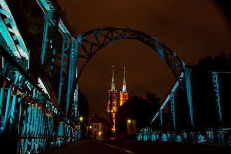 View of the Cathedral of St. John the Baptist  through the Tumski bridge. Wroclaw, Polandの写真素材