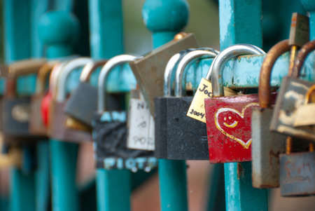 Padlocks hanging on Tumski bridge in Wroclaw, Poland 