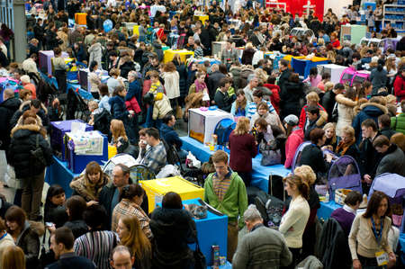MOSCOW - MARCH 6: Unidentified people visit an international exhibition of cats "Catsburg" on March 6, 2011 in the exhibition hall Crocus-Expo, Moscowのeditorial素材